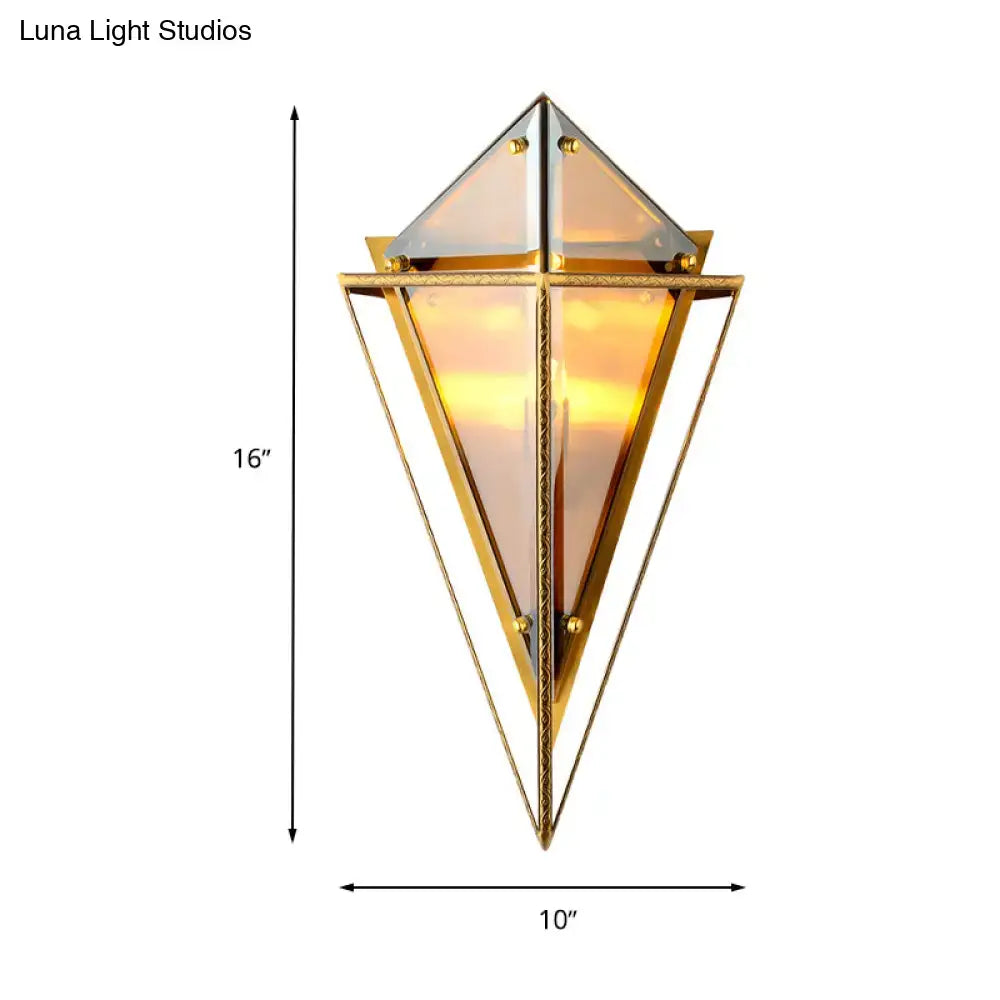 Minimalist gold-toned diamond wall light with clear amber and smoke gray glass panels for living room sconce