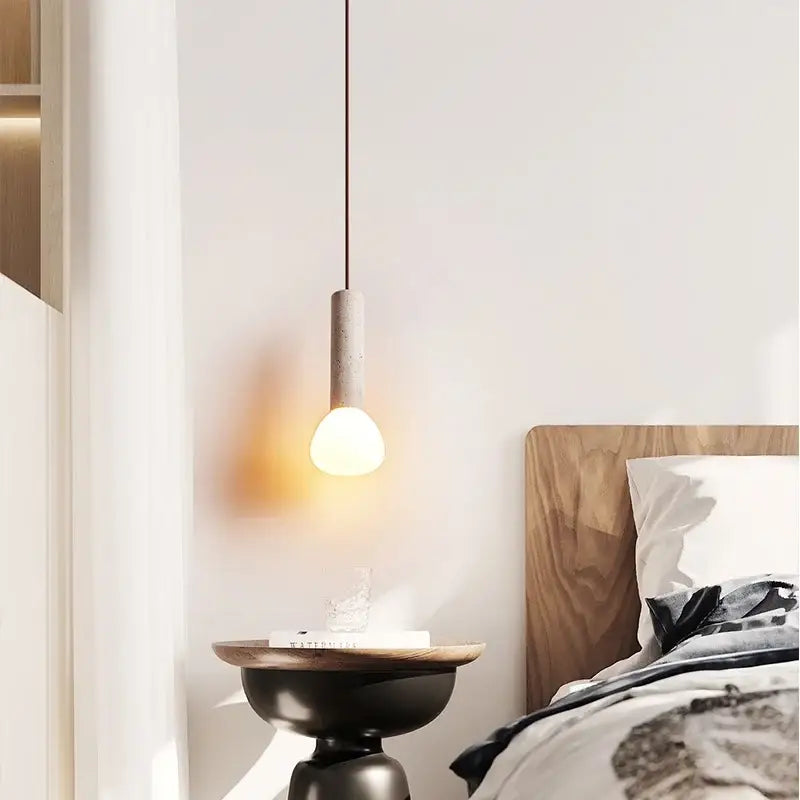Minimalist beige and white glass stone led pendant light with concrete cylindrical shade and warm bulb for kitchen decorbites pendant lights
