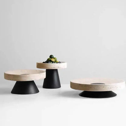 Minimalist concrete pedestal trays with matte black bases and decorbites beige travertine marble tops for modern decor