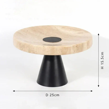 Minimalist beige travertine marble tray with black circular inset and tapered pedestal base for dining room serving