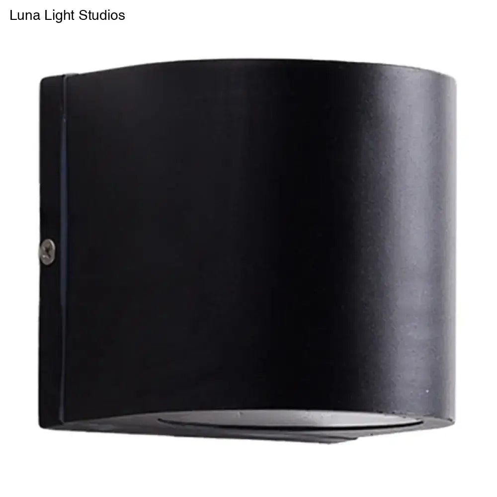 Minimalist black aluminum outdoor cylinder wall light with matte finish direct wired electric for outdoor space