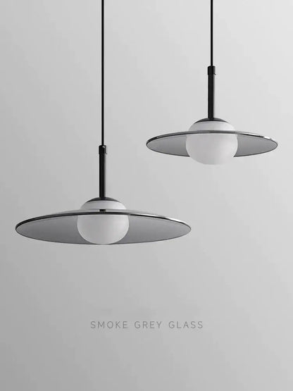 Minimalist black and copper decorbites glass pendant lamp with sleek smoke grey glass shades for bedroom light decor