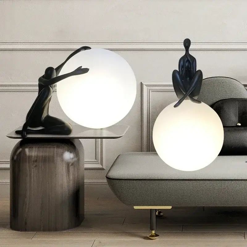 Minimalist black and white humanoid sculpture led table lamp featuring sleek decorbites humanoid sculpture design