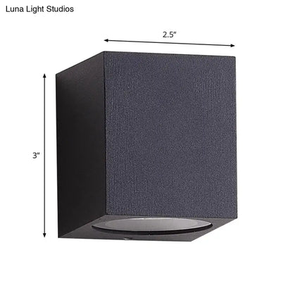 Minimalist black textured cube wall sconce with brass led flush mount circular recessed fixture for corridor lighting