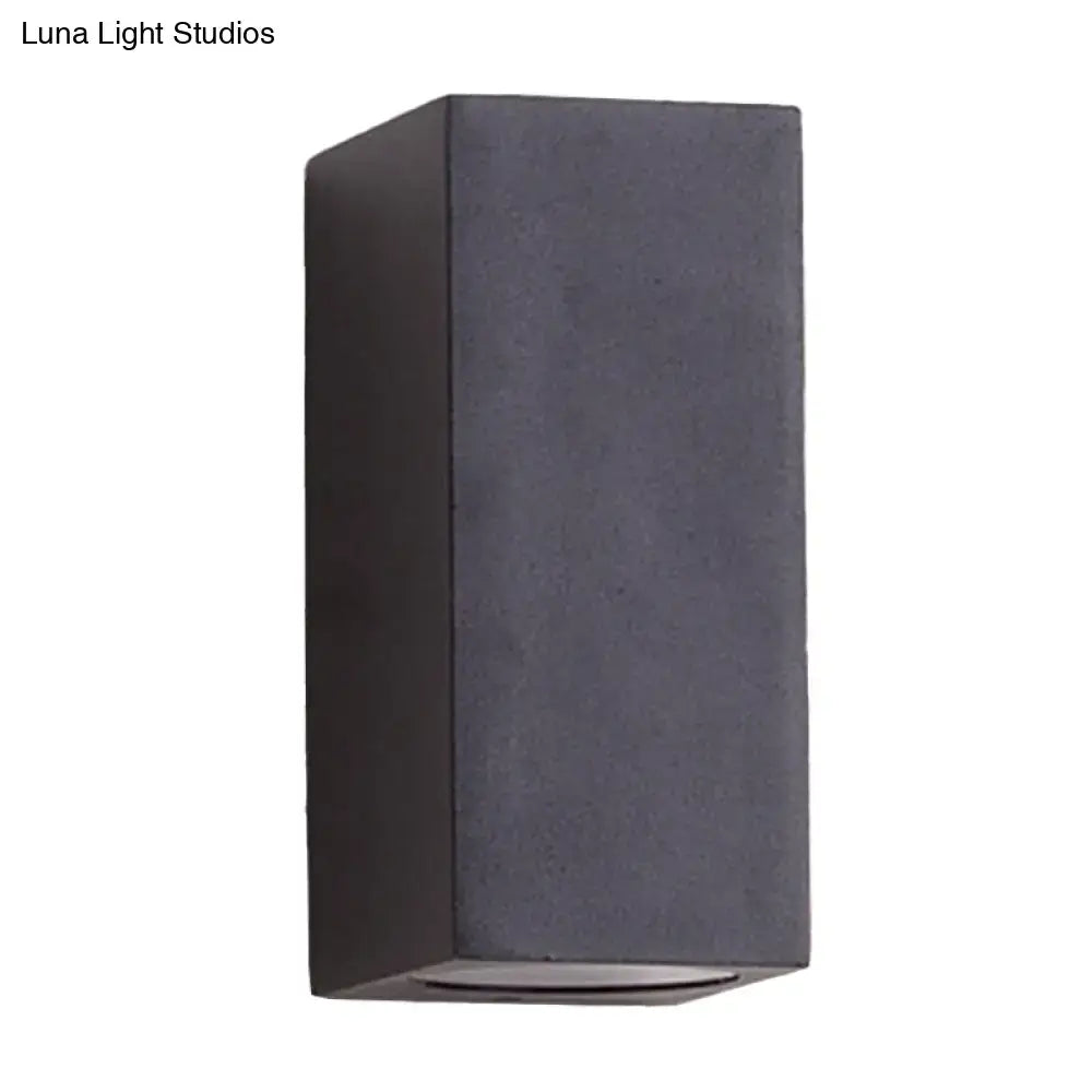 Minimalist black and brass led flush mount wall sconce with dark gray matte textured finish for corridor lighting