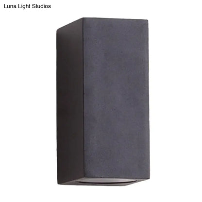 Minimalist black and brass led flush mount wall sconce with dark gray matte textured finish for corridor lighting