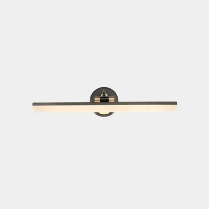Minimalist black and brass wall mounted vanity light with a sleek finish and warm diffused illumination for bathroom