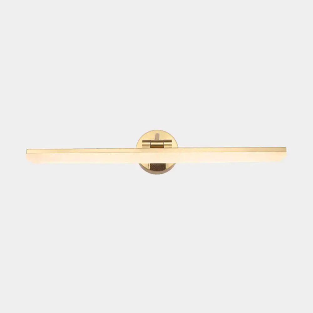 Gold-toned minimalist wall mounted vanity light with rectangular light bar and circular mounting plate in brass finish