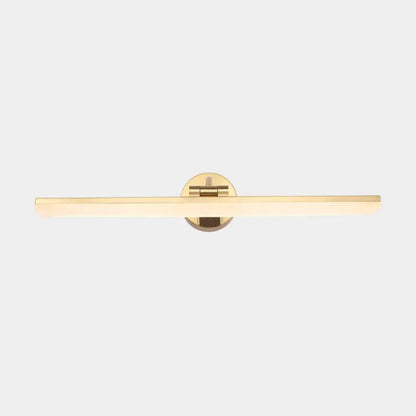 Gold-toned minimalist wall mounted vanity light with rectangular light bar and circular mounting plate in brass finish