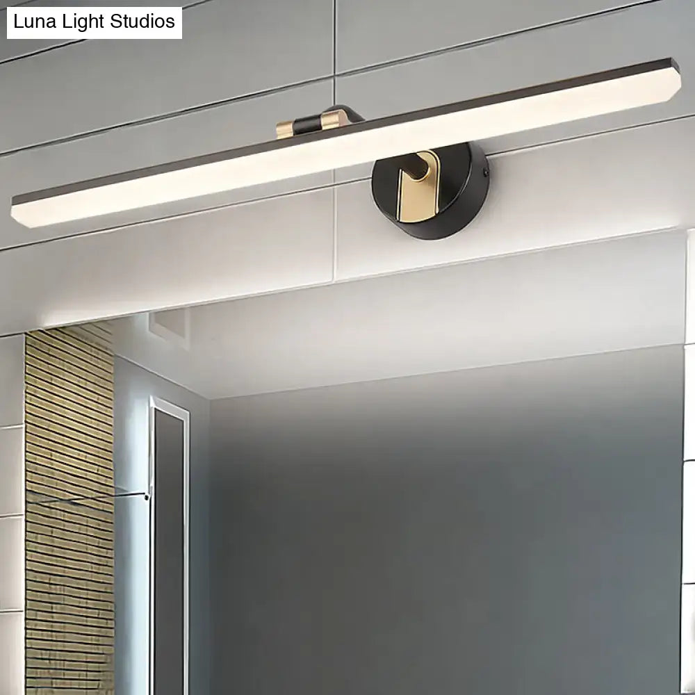 Modern black and brass wall mounted vanity light with sleek rectangular design for bathroom vanity lighting