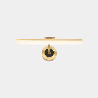 Gold-finished wall mounted vanity light with sleek rectangular illuminated bar and circular brass base for bathroom use