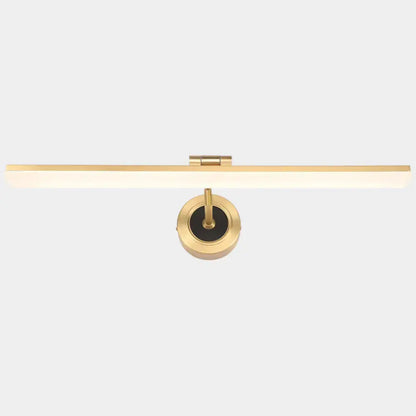 Gold-finished wall mounted vanity light with black rectangular shade and circular brass base for bathroom use