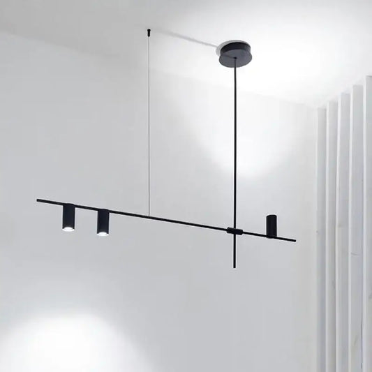 Minimalist black chandelier pendant lights with three cylindrical led bulbs on a sleek bar for dining room decorbites pendant lights