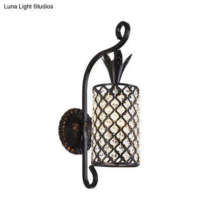 Minimalist black wrought iron wall sconce with cylindrical crystal lattice shade and ornate arm for 110v-120v use