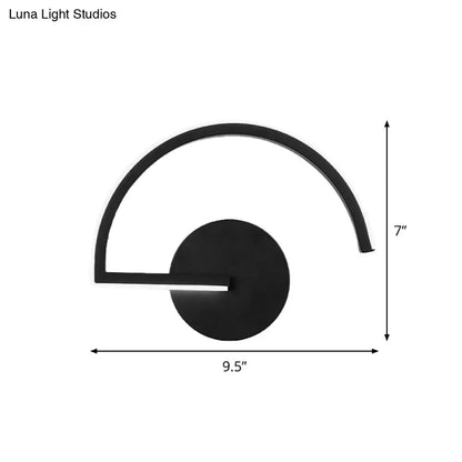 Minimalist black curved wall mounted lighting sconce with sleek arm and circular base for bedroom mounted lighting