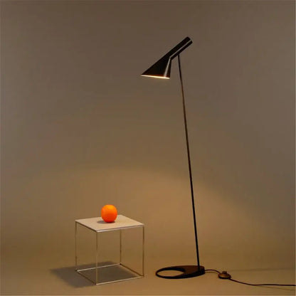 Minimalist black decorbites adjustable led floor lamp with sleek conical shade and slender metal stand for living room