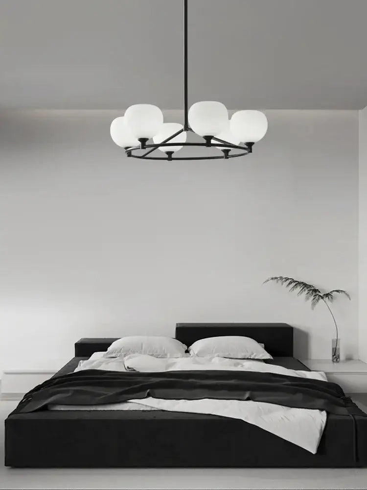 Minimalist black decorbites copper glass chandelier with six frosted globe lights for dining room lighting