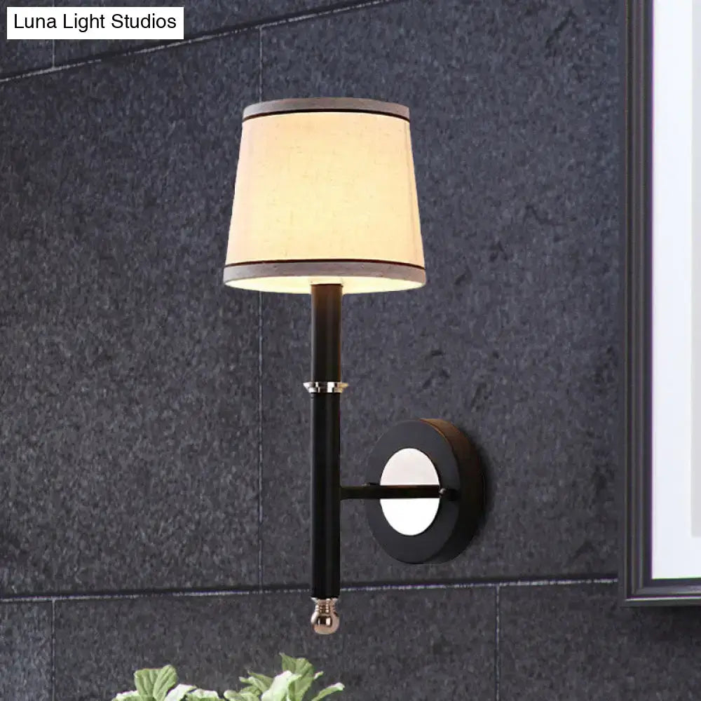 Minimalist black flaxen sconce light with cream fabric shade and polished brass accents for 110v-120v 220v-240v use
