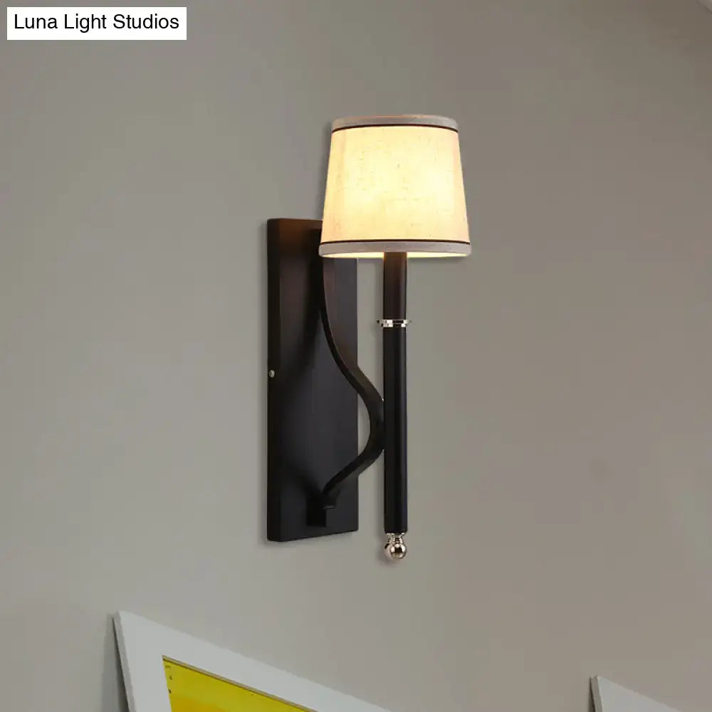 Black flaxen minimalist sconce light with black wrought iron and cream fabric shade for 110v-120v 220v-240v bedroom use