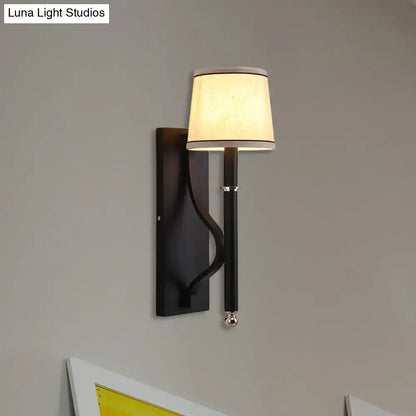 Black flaxen minimalist sconce light with black wrought iron and cream fabric shade for 110v-120v 220v-240v bedroom use