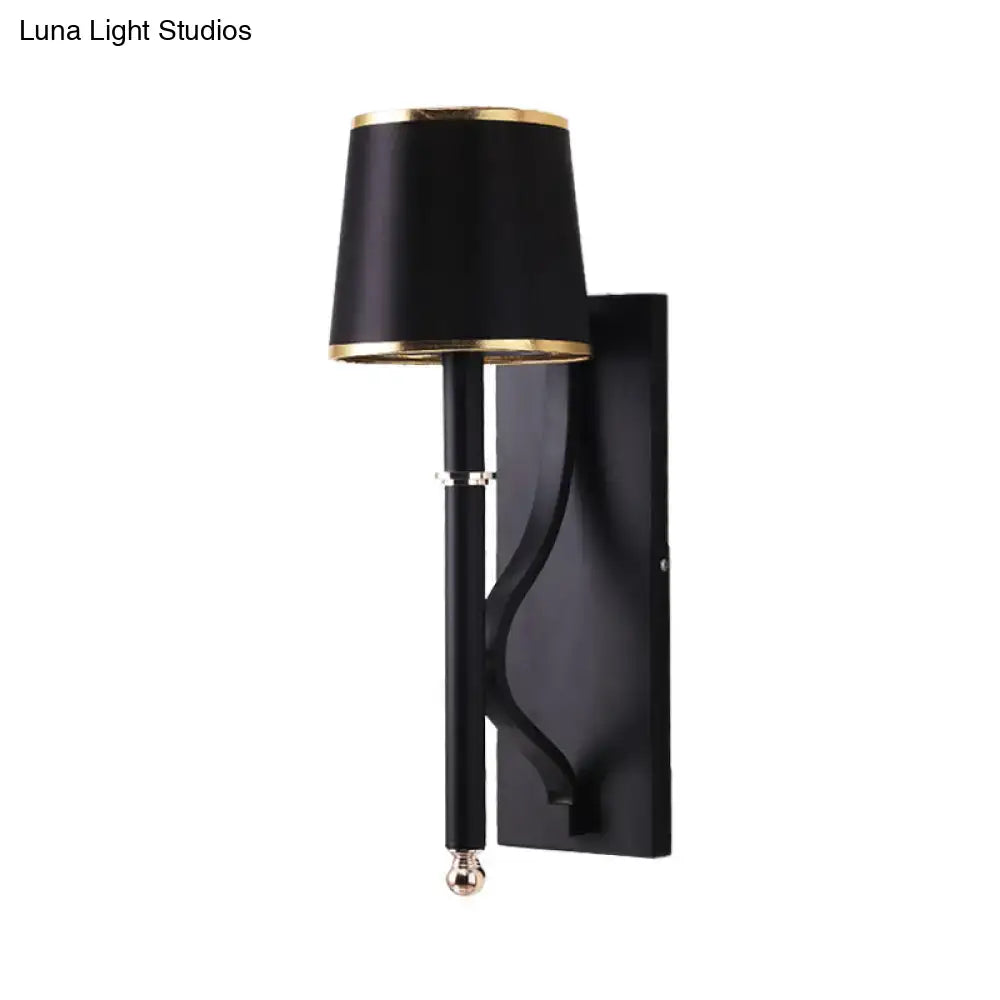 Minimalist black flaxen sconce light with gold-trimmed lampshade and polished brass accents for 110v-120v 220v-240v use