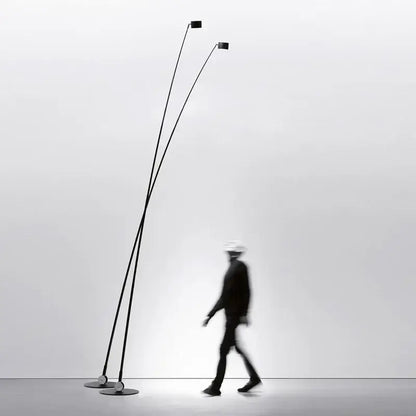 Minimalist black floor lamp with curved LED arms and circular light fixtures for modern living room decorbites black floor lamp
