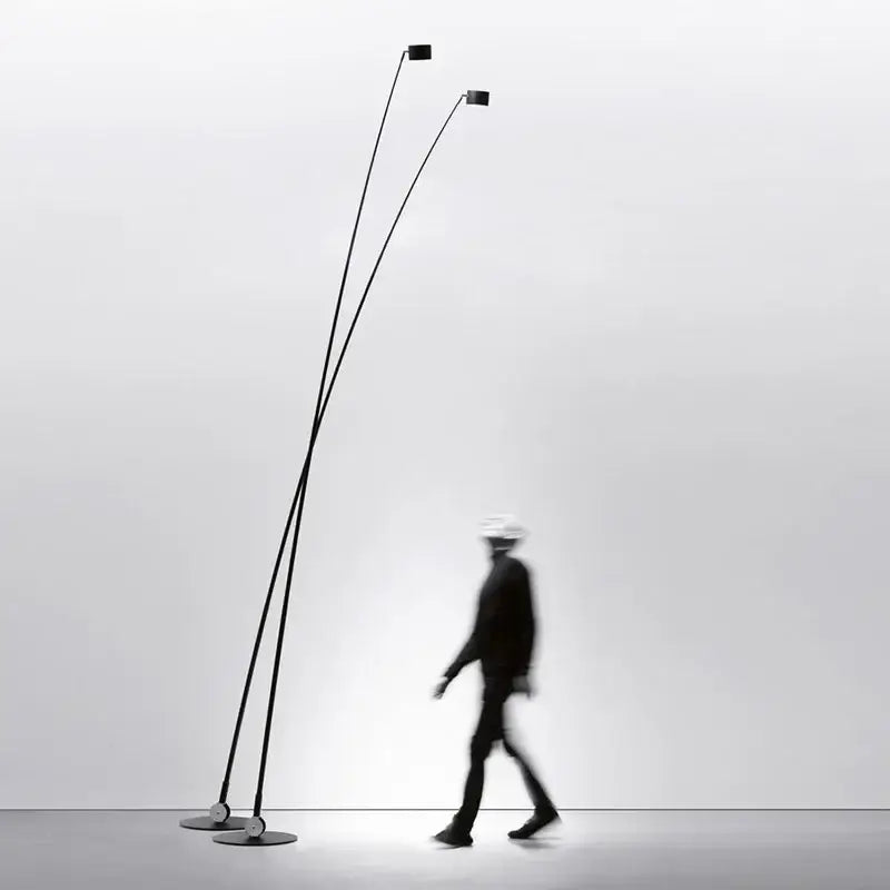 Minimalist black floor lamp with curved LED arms and circular light fixtures for modern living room decorbites black floor lamp
