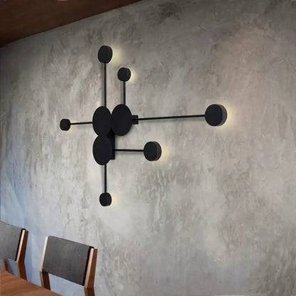 Minimalist black geometry led wall light with circular fixtures and sleek metal arms for living room bedroom decorbites geometry led wall