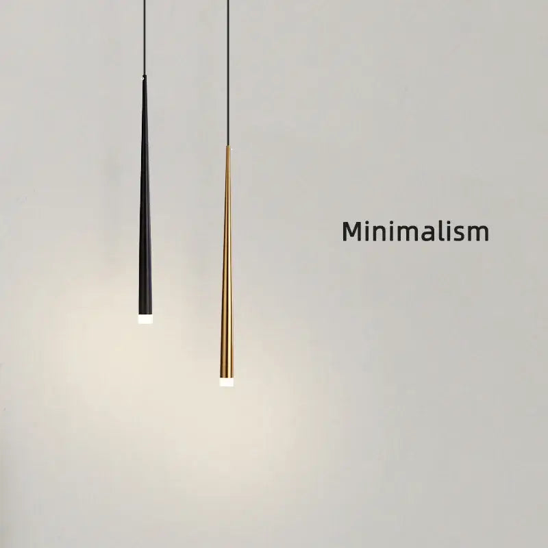 Two minimalist black and gold decorbites cone tube pendant lights with conical shapes for kitchen or dining room decor