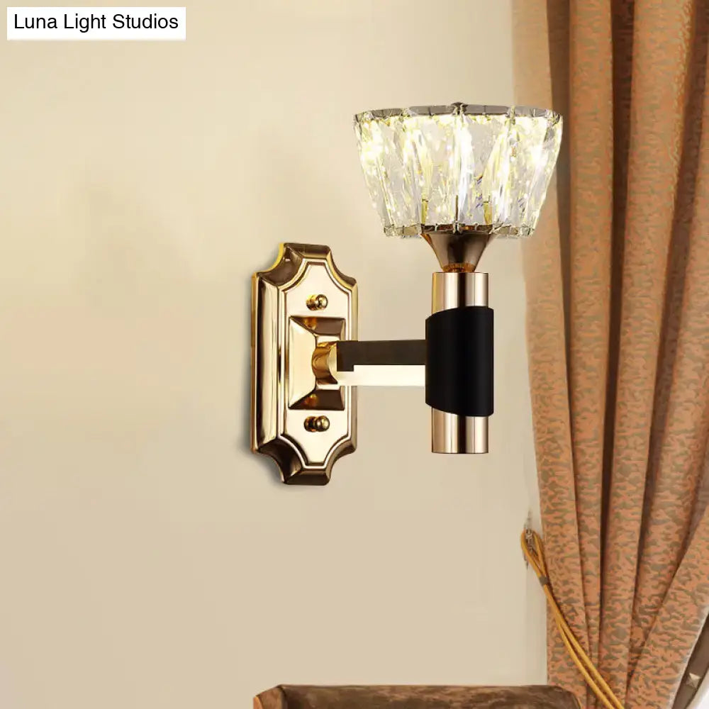 Elegant minimalist black and gold crystal wall sconce with gold metal base, black band, faceted shade, and e26 e27 bulb base
