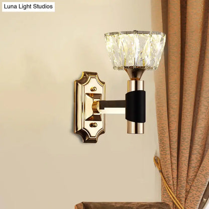 Elegant minimalist black and gold crystal wall sconce with gold metal base, black band, faceted shade, and e26 e27 bulb base