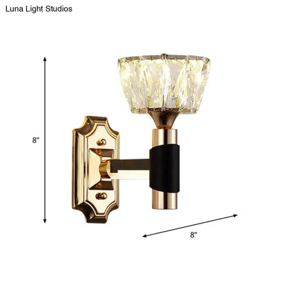 Minimalist gold-toned wall sconce with faceted crystal shade and black accent band for e26 e27 bulb base lighting