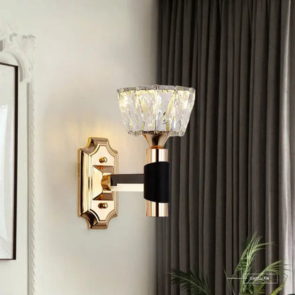 Minimalist black and gold wall sconce with faceted crystal shade and black accent band for e26 e27 bulb base lighting