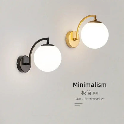 Minimalist black and gold glass ball wall light with frosted glass globes for elegant bedroom decorbites glass ball sconce