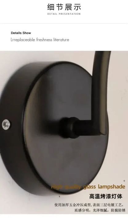 Minimalist black matte decorbites glass ball wall light with curved arm and high-quality glass lampshade bedroom sconce