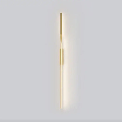 Minimalist black and gold decorbites led wall sconce with sleek cylindrical design and central rectangular accent for bedroom