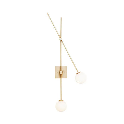 Minimalist black and gold bedroom light fixture with metal arm and opal glass bubble shades in a modern wall sconce design