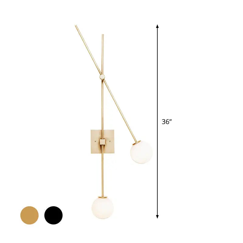 36-inch modern wall sconce light fixture with brushed brass metal arm and opal glass bubble shades for bedroom use
