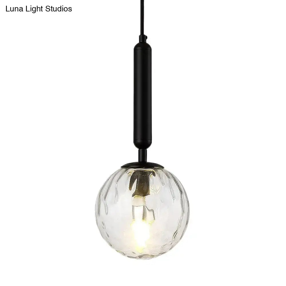 Minimalist black gold spherical glass globe pendant light with clear textured globe and black metal rod 10 inch fixture