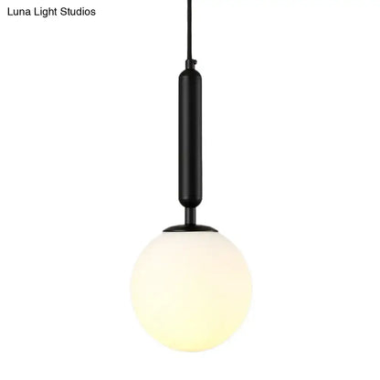 Minimalist black gold inch fixture spherical wall sconce with black cylindrical pendant and frosted glass globe