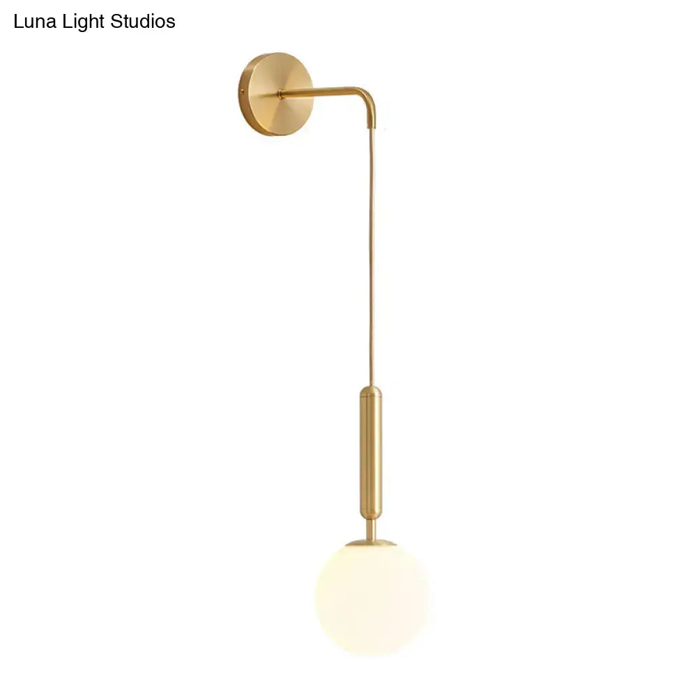 Minimalist black gold spherical wall sconce with gold finish and frosted glass globe 12 inch fixture for bedroom lighting