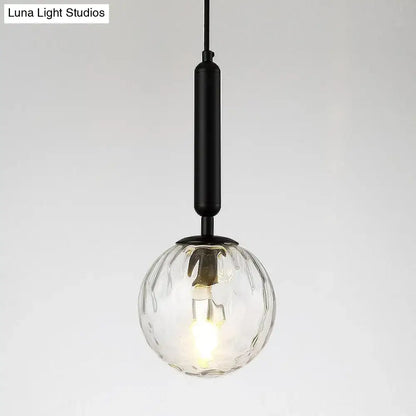 Minimalist black gold glass globe wall sconce with clear textured glass and black metal rod 8 inch fixture for bedroom lighting