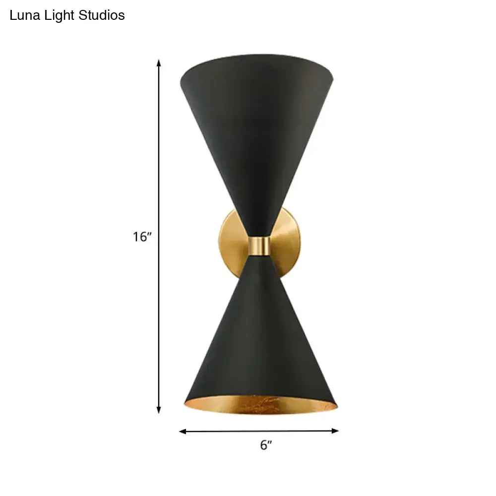 Minimalist black and gold wall lamp with two double cone-shaped matte finish shades and brass accent for bedroom use
