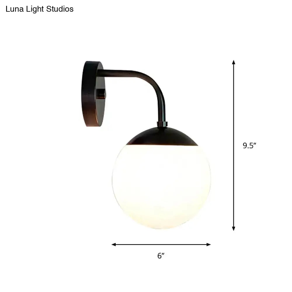 Minimalist golden black wall light with black wrought iron sconce and milky glass ball for bedroom lighting