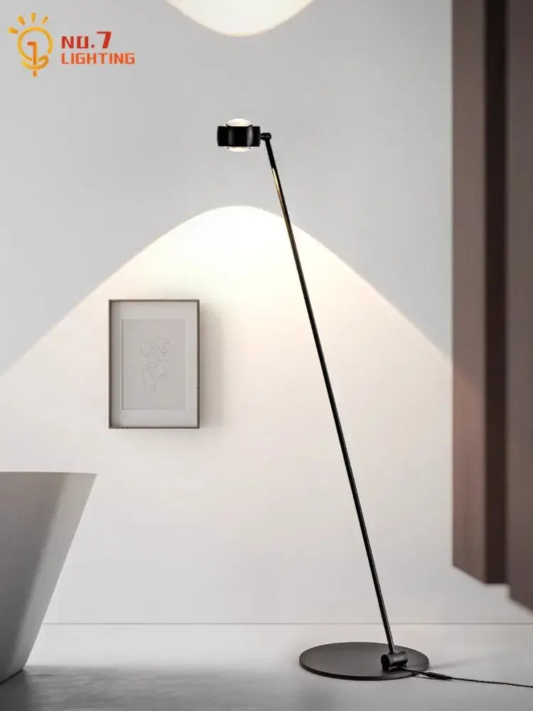 Black metal floor lamp with sleek adjustable arm featuring induction dimming for modern living room decorbites design