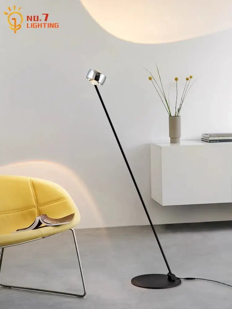 Minimalist black floor lamp with induction dimming and sleek chrome adjustable head for modern living room decorbites induction dimming