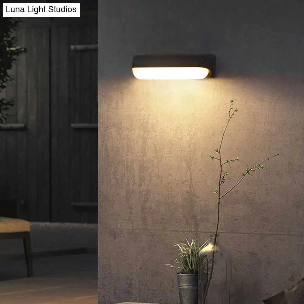 Minimalist black led wall sconce capsule yard fixture 220v-240v emitting warm even glow from modern inch fixture