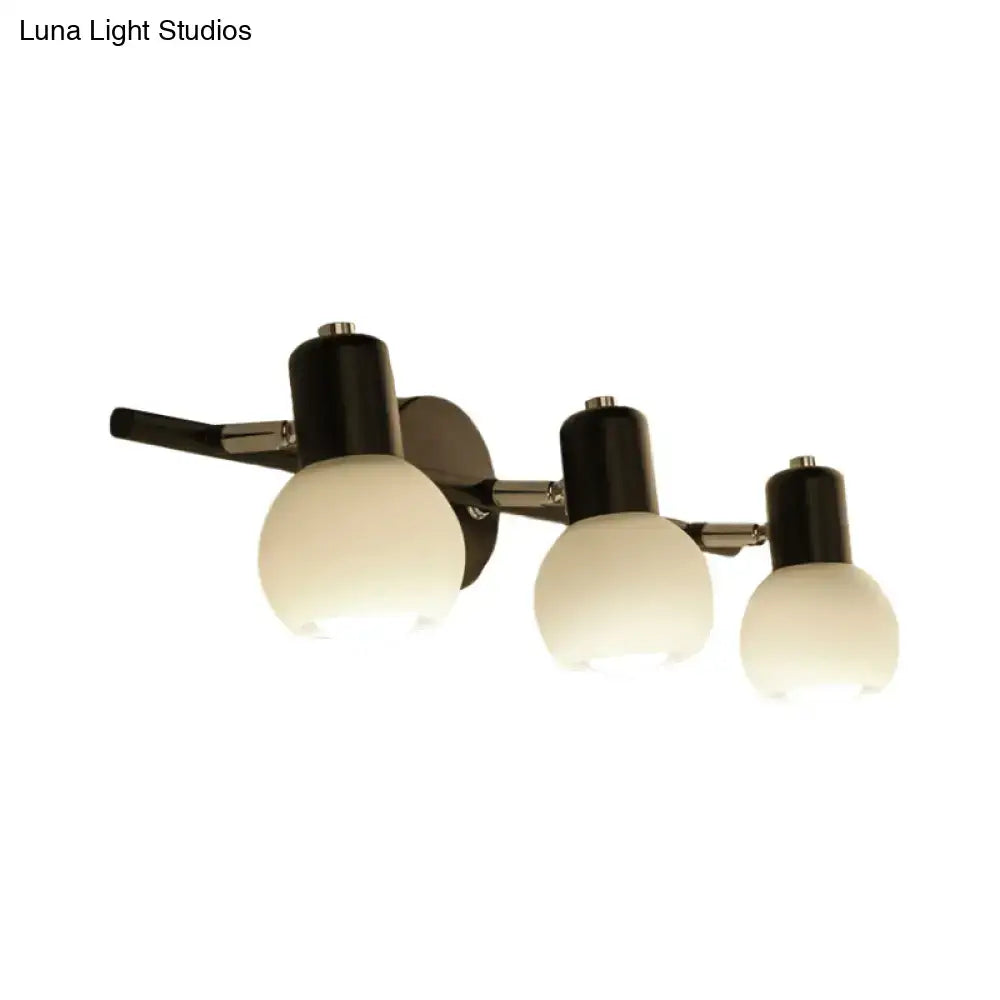 Modern black linear design wall lamp with chrome accents and opal glass globes for minimalist study room lighting