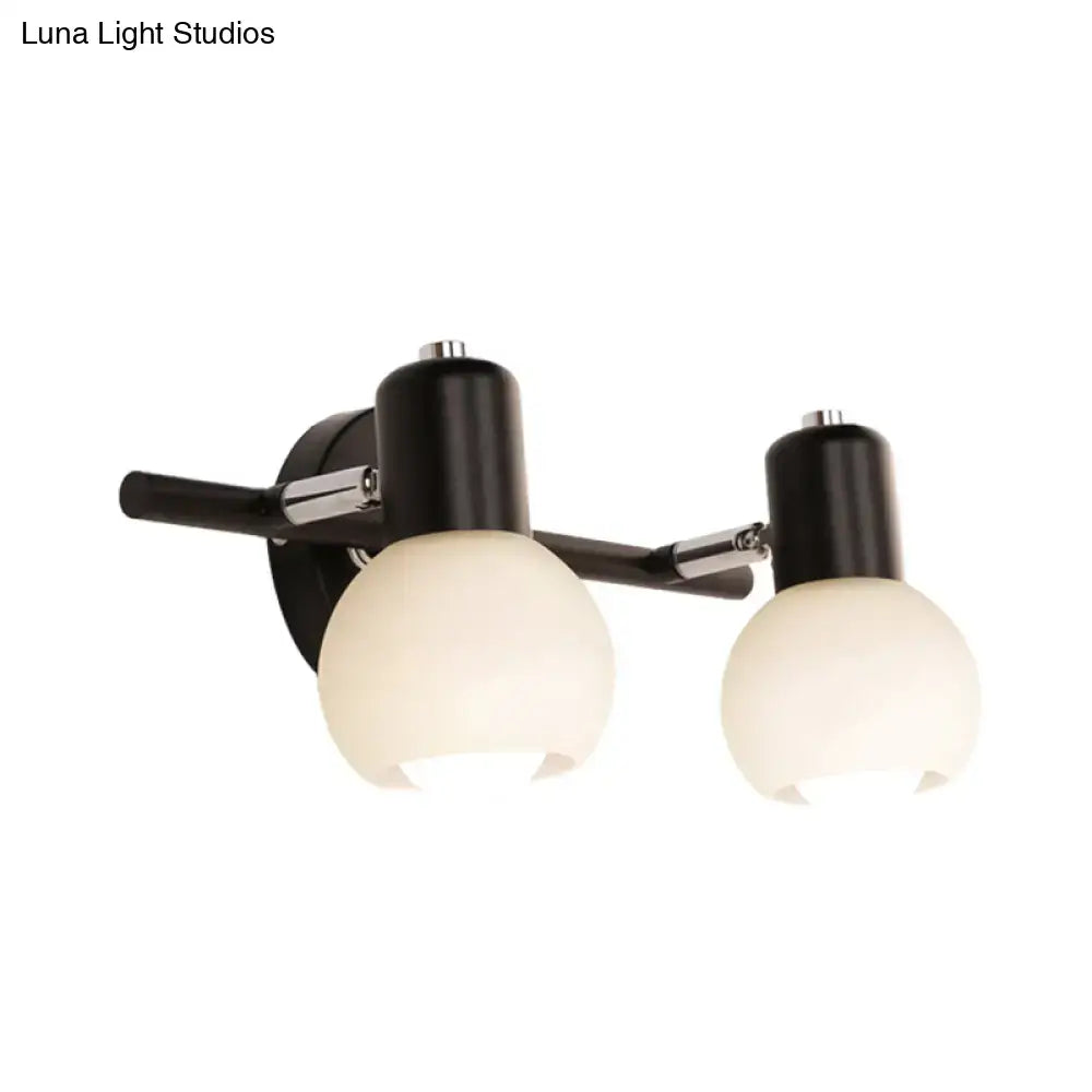 Minimalist black wall lamp with linear design, opal glass shades, and chrome accents ideal for study room lighting