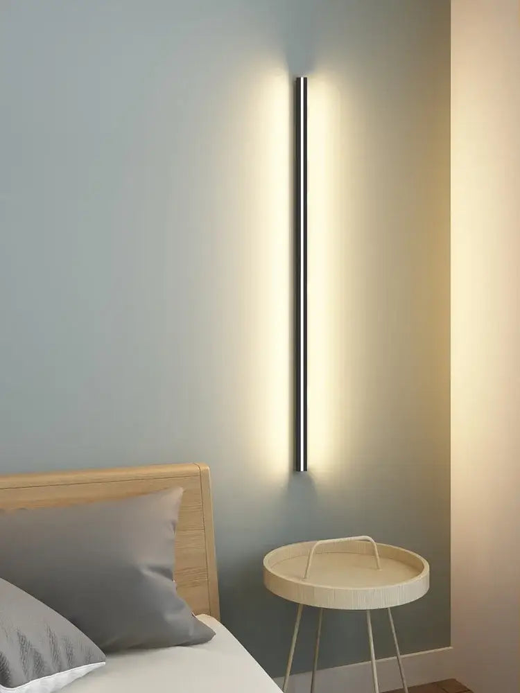 Minimalist black linear led wall lamp with sleek finish and warm glow ideal for bedroom wall and bedroom wall lamp use